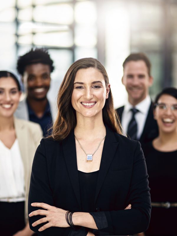 Business people, portrait and office with teamwork, diversity and support with corporate professional. Legal aid, attorney and lawyer with confidence, leader or collaboration with management or smile.